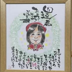 書家と似顔絵のコラボ